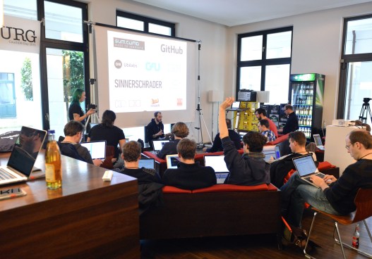 Ola and Sven showing Hoodie